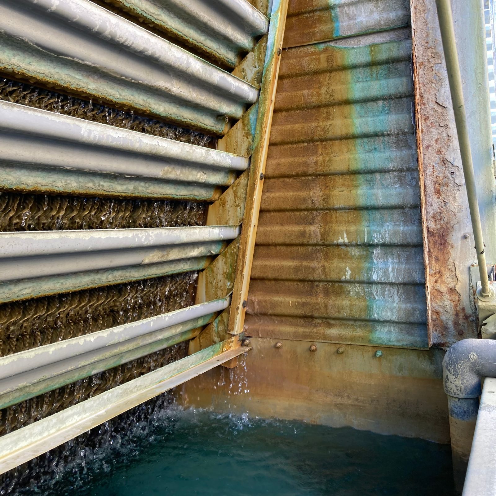 Corrosion and mineral deposits inside a cooling tower