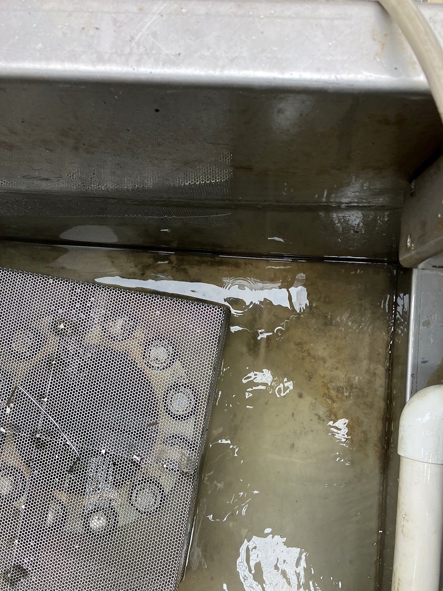 Clean cooling tower sump after service
